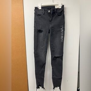Black American Eagle distressed skinny jean NWT Womens 0 Next Level Stretch Temp